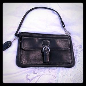 Coach black leather wristlet with zip closure
